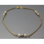 A 9ct Gold and Pearl Bracelet, 1.4g