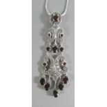 A Silver and Garnet Necklace