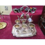 A Silver Plated Egg Cruet for six