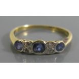 An 18ct Gold and Platinum, sapphire and Diamond Ring, size K, 1.6g