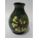 A Moorcroft Hibiscus Vase, with paper label to Late Queen Mary, 20cm