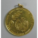 An 18KT Gold 1979 United Nations Medallion, 15.5g