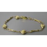 A 9ct Gold Heart Bracelet, 4.9g