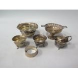 A Silver Sugar Bowl, one other bowl with piercced rim, napkin ring and three part cruet, 230g