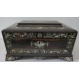 A 19th Century Coromandel and Mother of Pearl Inlaid Sewing Box fitted with ivory cotton reels etc.,