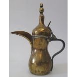 An Antique Persian Brass Coffee Pot with Tughra mark, 27cm