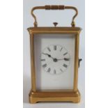 A 19th Century Repeating Brass Carriage Clock, 18cm to top of handle, running and repeat working