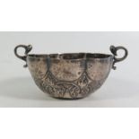 A White Metal Porringer with chased foliate decoration, probably 18th century, 46g, 11.5cm to