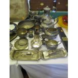 An Electroplated Silver Four Part Tea Set, pair of urns, candle nips on trays etc