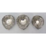 A Victorian Embossed and Pierced Silver Dish London 1893 C.C and two others, 66g