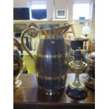 A Large Victorian Coopered Jug with brass mounts, 54cm tall