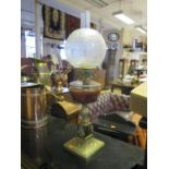 A Victorian Brass Oil Lamp with cut glass reservoir