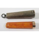 An Amber Cheroot Holder with 9ct gold collar and Chester silver sleeve