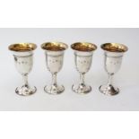 A Set of Four Elizabeth II Silver and Gilt Lined Goblets, Birmingham 1962, B&Co., 322g