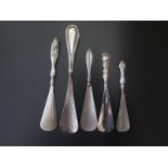 A Collection of Five Silver Handled Shoe Horns