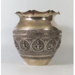 An Indian White Metal Vase decorated with Hindu gods and scrolling foliage, 566g, 19cm