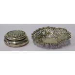 A Sterling Silver Circular Snuff Box with foliate embossed hinged cover and damaged dish, 62g