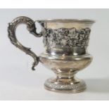 A George VI Silver and Gilt Lined Christening Mug with vine and grape border to the rim and the