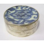 A Sterling Silver Circular Box with inset antique Chinese blue and white porcelain panel to the lid,