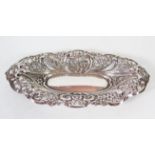 A Victorian Floral Embossed and Pierced Oval Dish, Birmingham 1893, 86g, 21x10cm and plated bowl