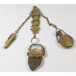 A Nineteenth Century Austro Hungarian Gilt Metal Chatelaine comprising purse with hinged top