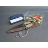 An Overland Fisherman's Friend in original leather sheath, Smith & Wesson boxed penknife and