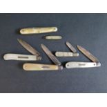 Four Victorian and later Silver and Mother of Pearl Fruit Knives and two others