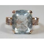 14ct Yellow Gold Aquamarine and Diamond ring featuring centre, rectangular cut, light blue