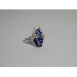 14ct White Gold Tanzanite, Sapphire and Diamond art deco style ring featuring, 2 trillion cut,