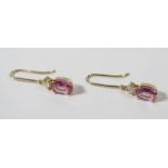 14ct Yellow Gold Sapphire and Diamond earrings featuring, 2 x oval cut, medium pink Sapphires (1.