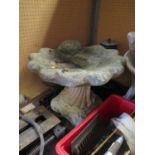 A Concrete Scallop Shaped Bird Bath