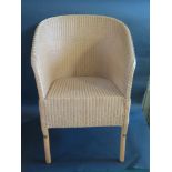 A Lloyd Loom Montpellier Armchair (£235 new), one of a pair _ option if bought first