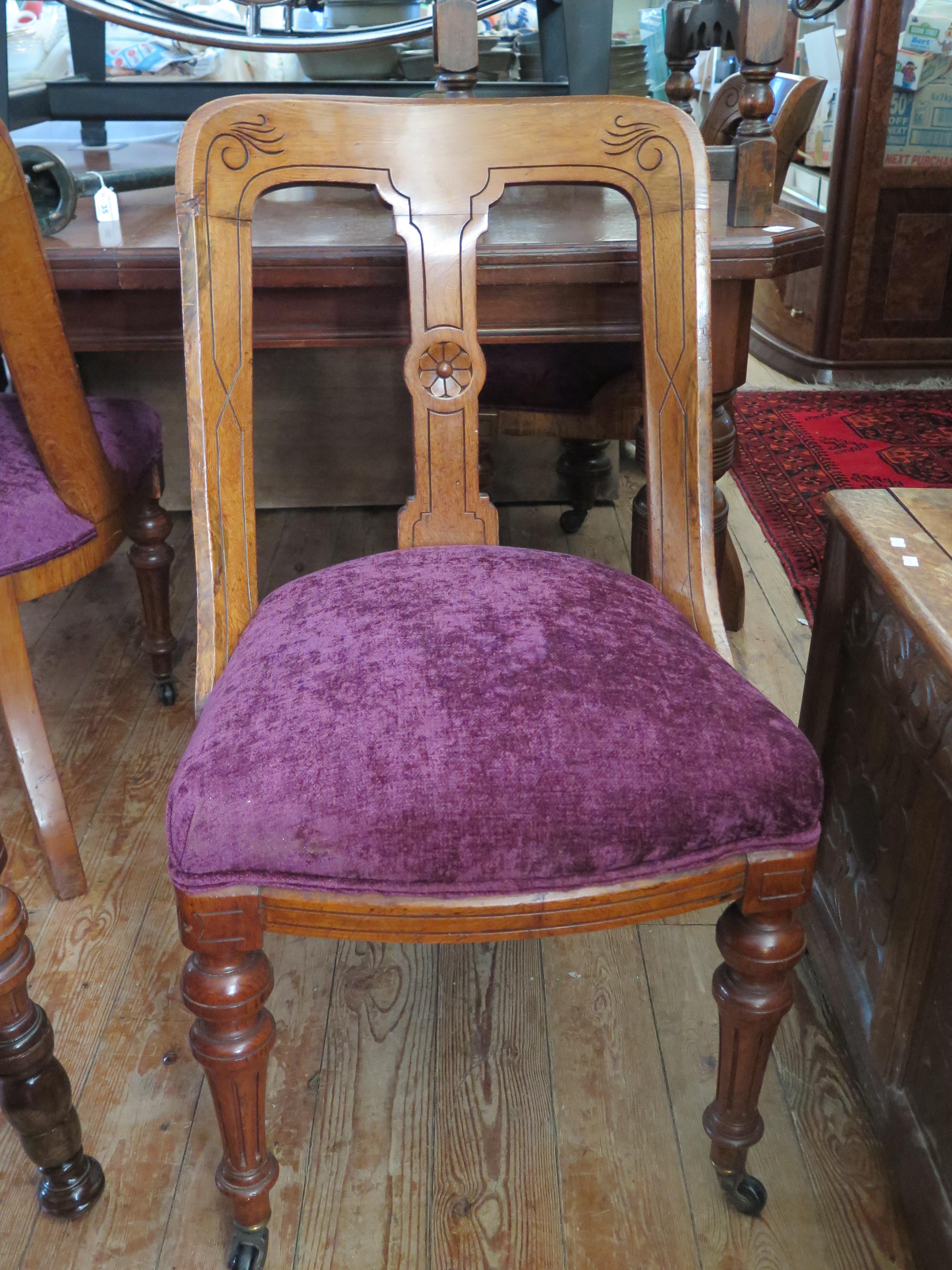 A Set of Six Victorian Oak Dining Chairs with new purple plush upholstery (matching salon suite next