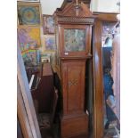 An Oak and Marquetry Inlaid Longcase Clock with modern movement