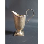 An Edward VII Silver Helmet Shaped Creamer, London 1906, Goldsmiths & Silversmiths Co. Ltd., 94g