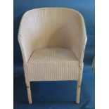 A Lloyd Loom Montpellier Armchair (£235 new), one of a pair _ option on second