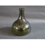 An 18th/19th Century Mallet Shape Green Glass Bottle, 18cm
