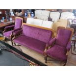 A Victorian Oak Three Piece Salon Suite in new purple plush upholstery and stool (matches previous