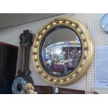 A Gilt Framed Convex Mirror, 57cm diam.