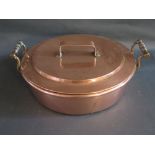 A Nineteenth Century Copper Two Handled Pan with lid, 40cm diam. to handles