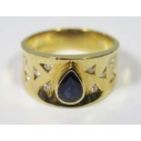 18ct Yellow and White Gold Sapphire and Diamond ring featuring centre, pear cut, deep blue