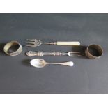 A Silver and Mother of pearl Bread Fork, one other silver fork, silver teaspoon and pair of Egyptian