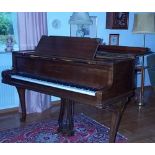 August Förster (c1956) A 5ft 3in grand piano in a walnut case on carved cabriole legs;