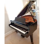 Yamaha (c2007) A 4ft 11in Model A1 grand piano in a bright ebonised case on square tapered legs.