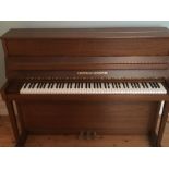 Grotrian Steinweg (c1987) An upright piano in a traditional style teak case; together with a stool.