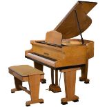 Monnington & Weston (c1930) A 'baby' grand piano in an Art Deco designed rare quilted maple