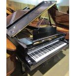 Kawai (c1968) A 6ft 8in grand piano in a bright ebonised case on square tapered legs.