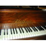 Blüthner (c1911) A 5ft 8in grand piano in a rosewood and gilt case on dual square tapered legs;
