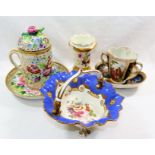 A 19th century Continental porcelain chocolate cup and cover and saucer, cup and cover 15cm high,