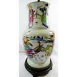 A 19th century Chinese famille rose vase, decorated in enamels with a battle scene,